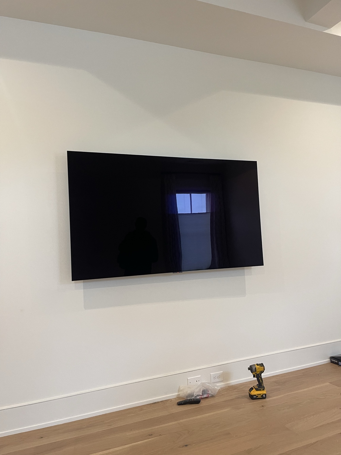 Mounted TV and wall detail work